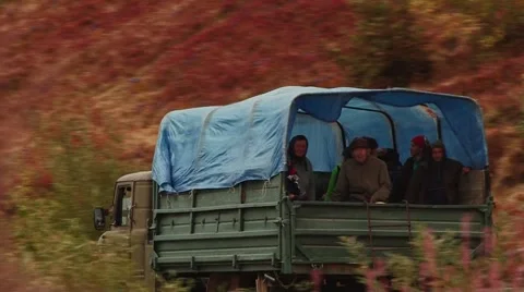 People rush in the car with mountains Stock Footage 68944039