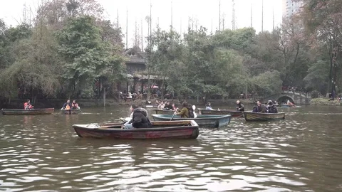 People sail tiny boats Stock Footage 125342348