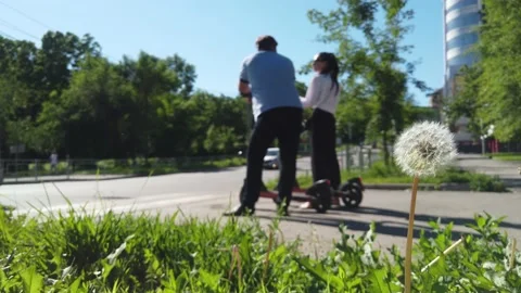 People on scooters and bicycles cross the road Stock-Footage 155816632