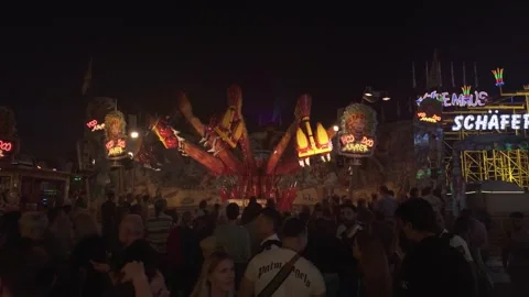 People screaming during the Voodoo Jumper ride at the Kiliani Festival Stock Footage 344793319