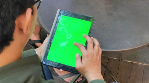 People scrolling with tablet green screen Stock Footage 272623786