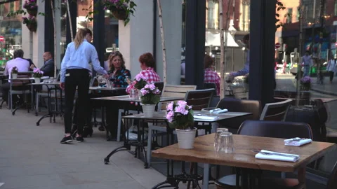 People seating dining and drinking coffee outdoor and restaurant in London Stock Footage 146293151