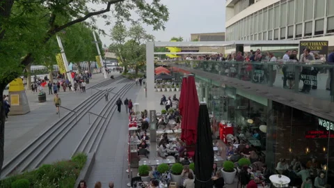 People seating dining and drinking coffee outdoor and restaurant in London Stock Footage 146671650