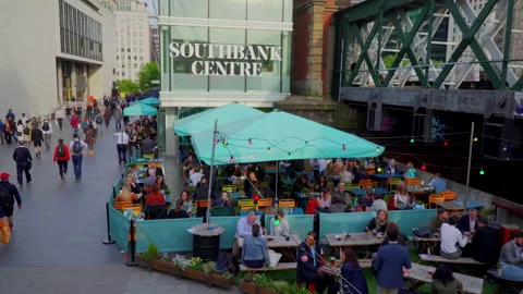 People seating dining and drinking coffee outdoor and restaurant in London Stock Footage 146672315