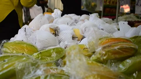 People selecting fruit in market fruit Stock Footage 265698112