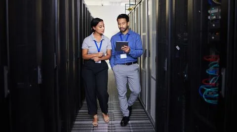 People, server room and teamwork on tablet, cybersecurity, engineering and Stock Photos