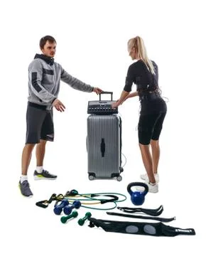 People setting parameters of EMS station Stock Photos