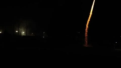 People setting up rocket for fireworks and running away Stock Footage 267620359