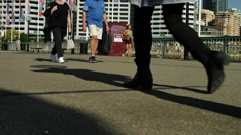 People shadows slow motion dolly on Pyrmont Bridge in Sydney 4K Stock-Footage 236448625