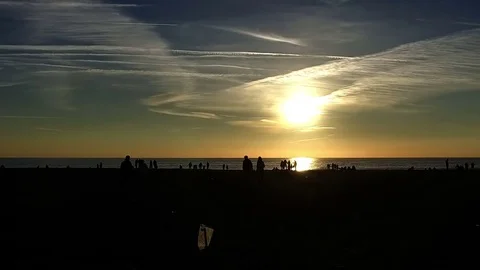 People shapes at sunset on the beach Stock Footage 73354182