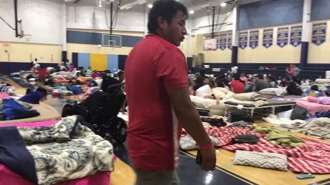 People at shelter in Florida during hurricane Irma Stock Footage
