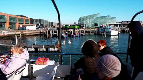 People on a ship prepare to leave the pier near Venice, Italy Stock Footage 262425667