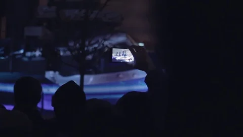 People shoots 3D mapping light show on a mobile phone. Stock Footage 82242171