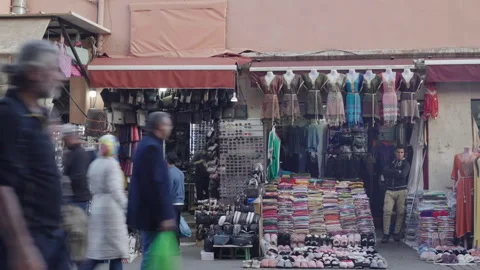 People shopping in Marrakech slow shutter speed Stock Footage 265451632