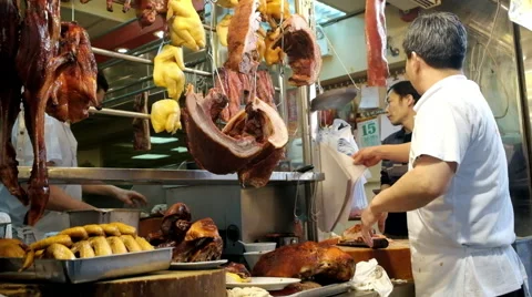 People shopping meat on the traditional asian street market. Hong Kong Stock Footage 59798029
