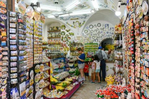 People shopping on a souvenir shop of San Gimignano, Italy Stock Photos