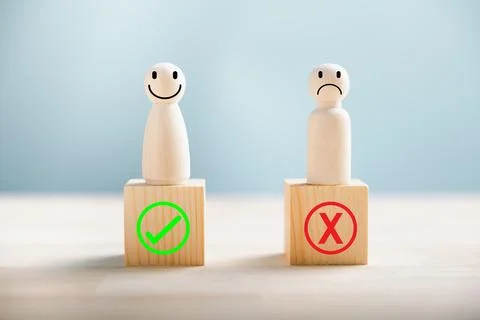 People showcase right and wrong on wooden blocks thinking yes or no. Busine.. Stock Photos