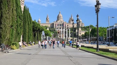 People on sidewalk to The National Art Museum of Catalonia Stock Footage 59366000