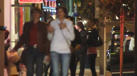 PEOPLE ON SIDEWALK AT NIGHT Video stock 5298071