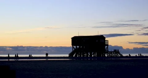 People as silhouettes at the beach Stock Footage 146086492