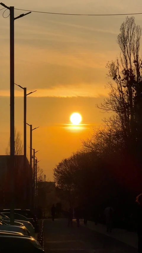 People Silhouettes Walking at Sunset in Bucharest Stock Footage 331935441
