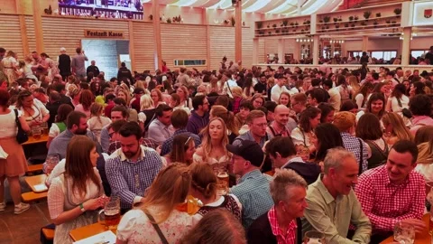 People singing and dancing together inside Beer Tent Stock Footage 273171763