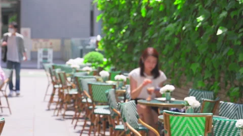 People sit down at  outdoor dining Cafe Restaurant in Harajuku, Shibuya, Tokyo, Stock-Footage 311489522