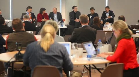 People sitting and actively discussing something in conference hall in Dublin, Stock Footage