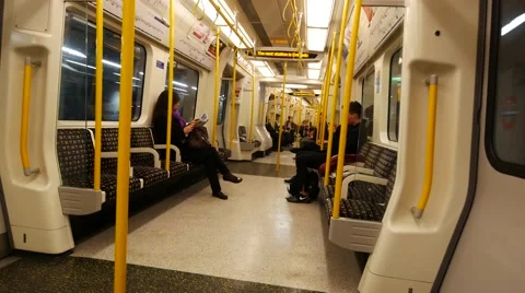 People sitting on a Bakerloo Line underground train in London Stock Footage 59740213