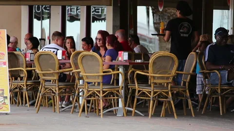 People sitting at restaurant Stock Footage 56882457