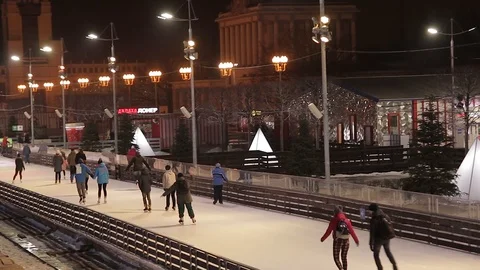 People skate on the ice rink in the winter 動画素材 107691453