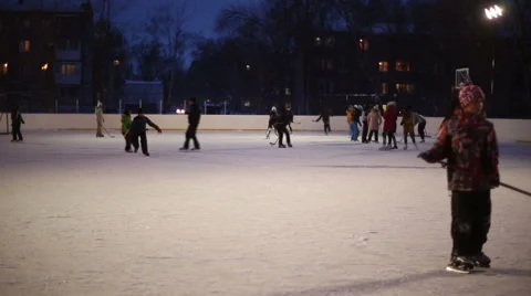 People skate on the outdoor ice rink Stock Footage 59142466