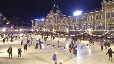 People skate on rink on the main square of Russia. Red Square in Moscow Stock Footage 120542753