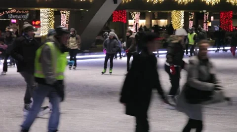 People skating on the ice ring toronto during Christmas epoch Stock Footage 62874998
