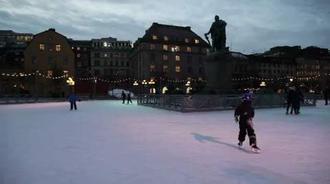 People on the skating ring in winter night Stock Footage 61791554