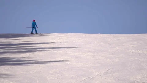 People skiing down the mountain Stock Footage 204806985