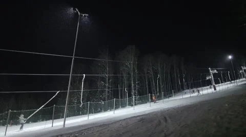 People skiing at night Stock Footage 46034318