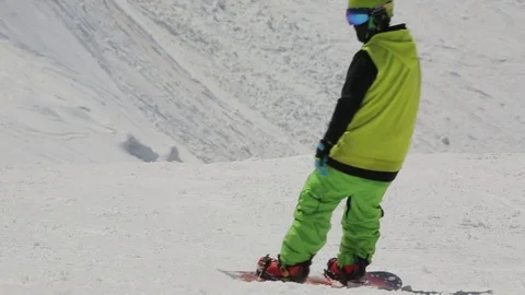 People skiing on snowboards Stock Footage 73353178