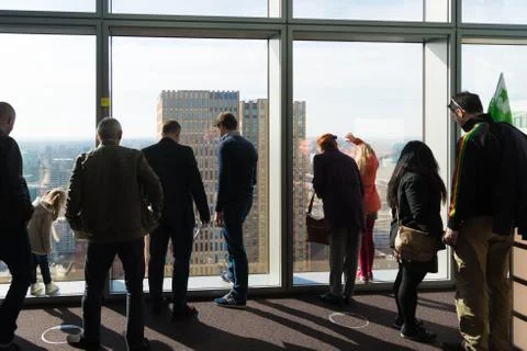 People in a skyscraper Stock Photos