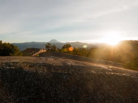 People sleeping on the top of mountains while sunrise Stock Photos