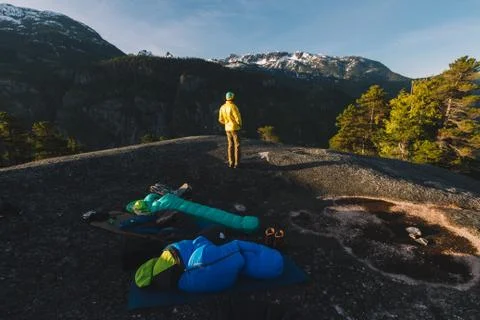 People sleeping on the top of mountains while sunrise Stock Photos
