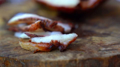 People slice grilled meat for cooking on blurred background Vídeo Stock 145841952