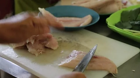 People slicing meat using a knife 스톡 동영상 282257600