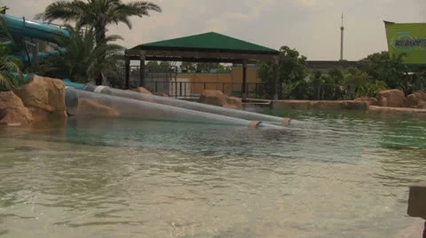 People Sliding Down Submerged Water Tube Slide Video stock 25878792