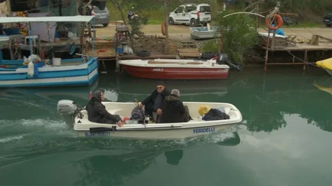 People on the small boat Stock Footage 168240975