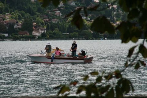 People on a small boat Stock Photos
