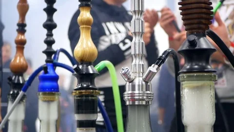 People smoking shisha cafe Stock Footage