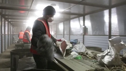 People sorts garbage on the conveyor Stock Footage 82054189