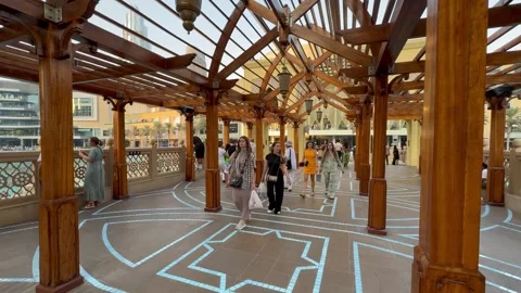People on the Souk Al-Bahar Bridge in Downtown. Dubai UAE 4 September 2026. Stock Footage 345154811