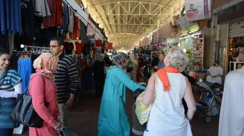 People in Souk El Had, the biggest bazar in Agadir Stock Footage 44782504